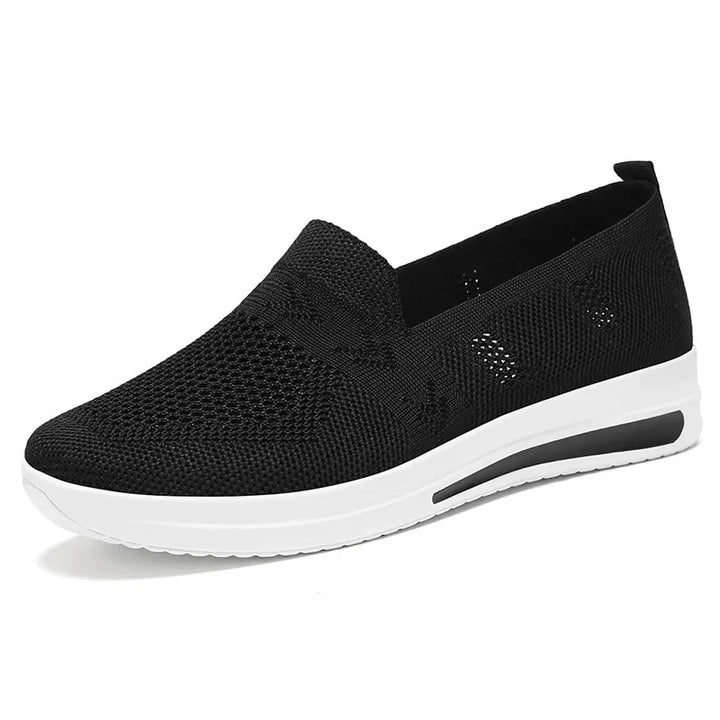 "Lätta andningsbara kvinnors mesh sneakers i modern design för vår och sommar. Lätt att bära med slip-on funktion."