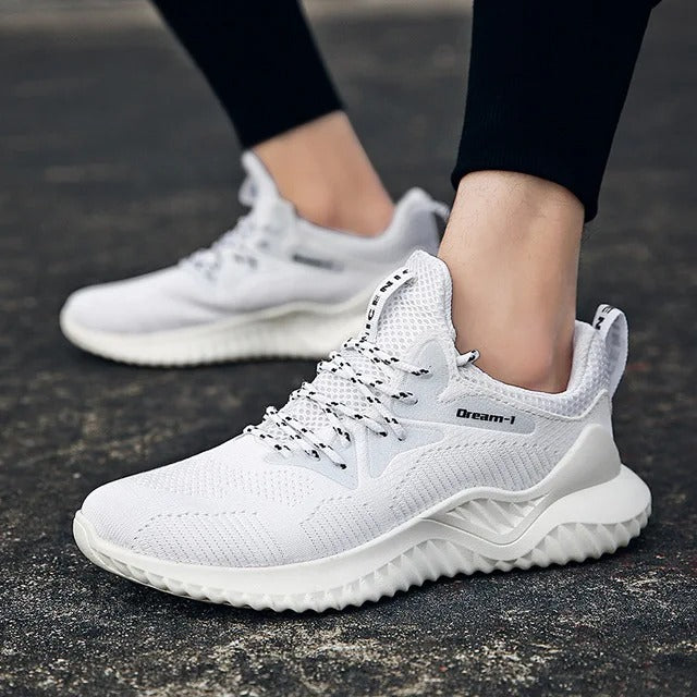 Lättvikts andningsaktiva sneakers i mesh för män, beige färg, ger optimal komfort och ventilation för en aktiv livsstil.