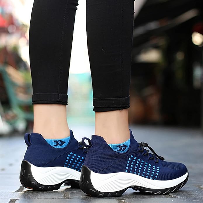 Luftkuddade damlöparskor med modern design i livfulla färger, mesh-ovandel och slip-on-modell för överlägsen komfort.