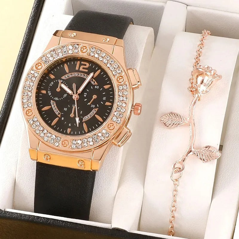 "Lyxig damklocka med strass, rosa band och kvartsurverk. Elegant och gnistrande design för en sofistikerad look."