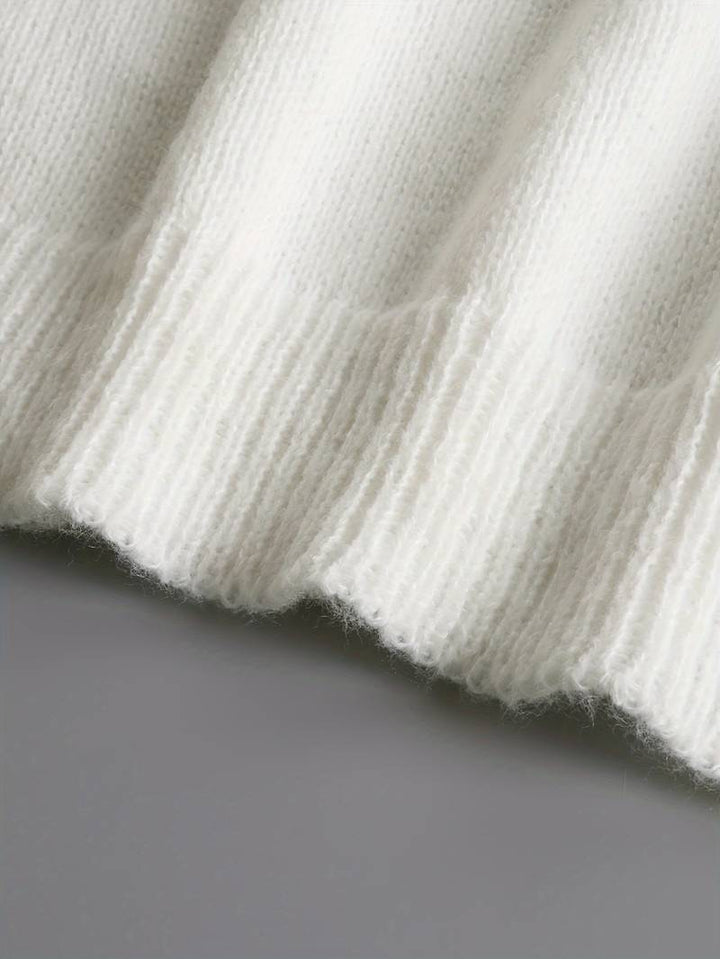 "Lyxig damtröja med V-ringning och knapppanel, elegant design i mjukt material för en stilfull och bekväm look"