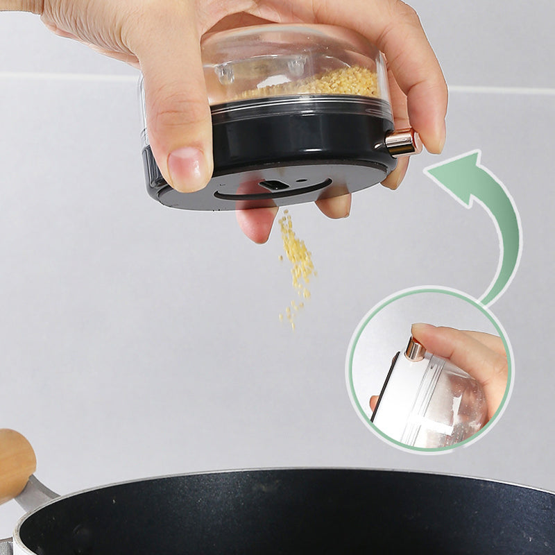 "Magnetiska kryddburkar i glas och ABS för stilren och praktisk kryddförvaring på väggen, med ergonomisk design."