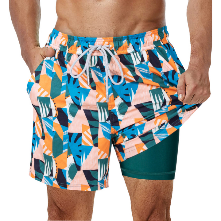Mörkblå 2-i-1 badshorts för män med stödjande foder, tryckt mönster och djupa sidofickor.