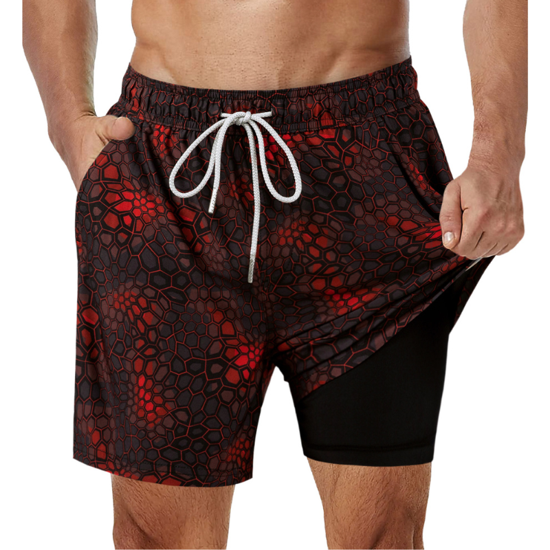 Mörkblå 2-i-1 badshorts för män med stödjande foder, tryckt mönster och djupa sidofickor.