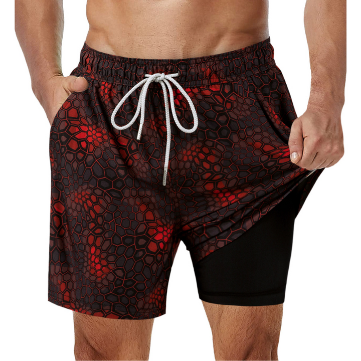 Mörkblå 2-i-1 badshorts för män med stödjande foder, tryckt mönster och djupa sidofickor.