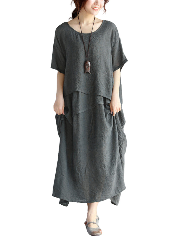 Maxi klänning dam med långa ärmar, luftig och oversized design. Perfekt för avslappnade och formella tillfällen.