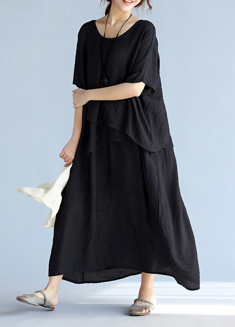 Maxi klänning dam med långa ärmar, luftig och oversized design. Perfekt för avslappnade och formella tillfällen.