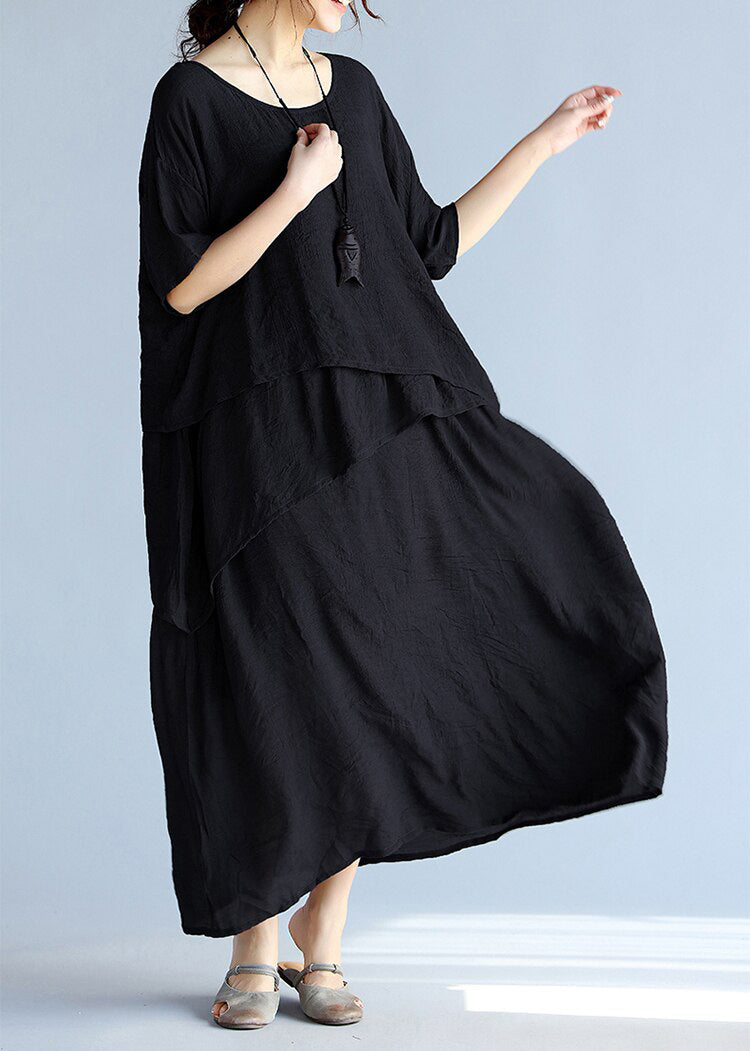 Maxi klänning dam med långa ärmar, luftig och oversized design. Perfekt för avslappnade och formella tillfällen.