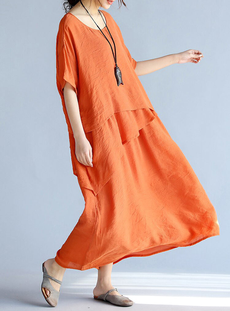 Maxi klänning dam med långa ärmar, luftig och oversized design. Perfekt för avslappnade och formella tillfällen.