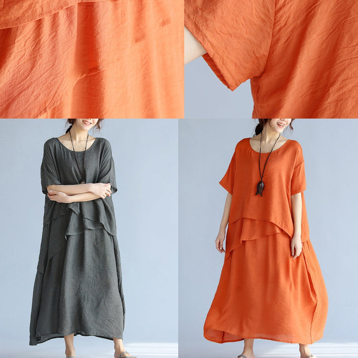 Maxi klänning dam med långa ärmar, luftig och oversized design. Perfekt för avslappnade och formella tillfällen.