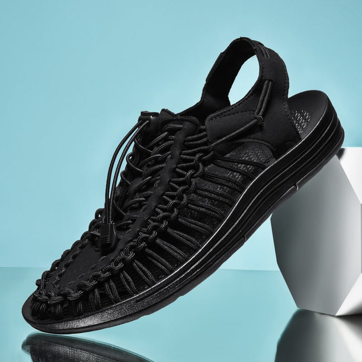 Mesh herrsandaler, andningsbar design, brun färg, optimal ventilation och grepp för strand- och stadsäventyr sommar.
