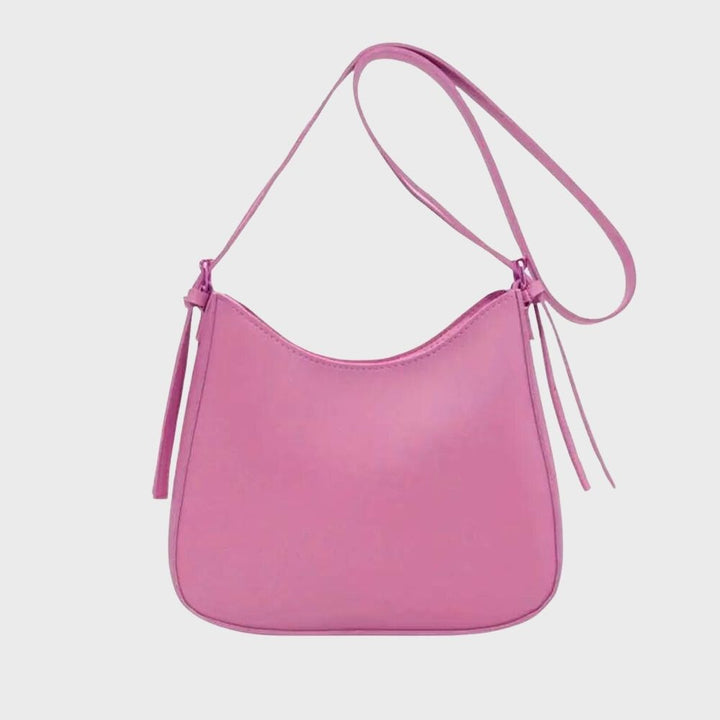 Minimalistisk crossbody handväska för kvinnor, elegant design, ergonomisk, flera färger, perfekt för alla tillfällen.