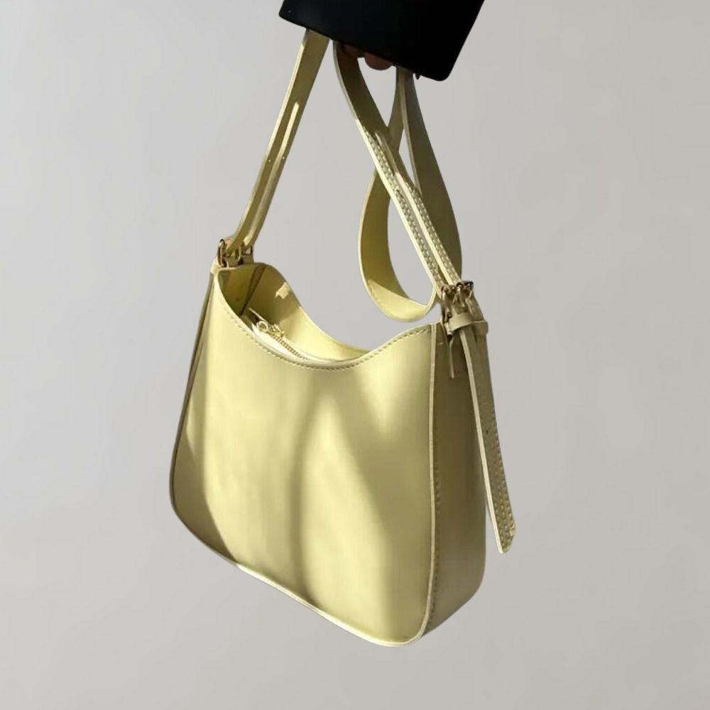 Minimalistisk crossbody handväska för kvinnor, elegant design, ergonomisk, flera färger, perfekt för alla tillfällen.