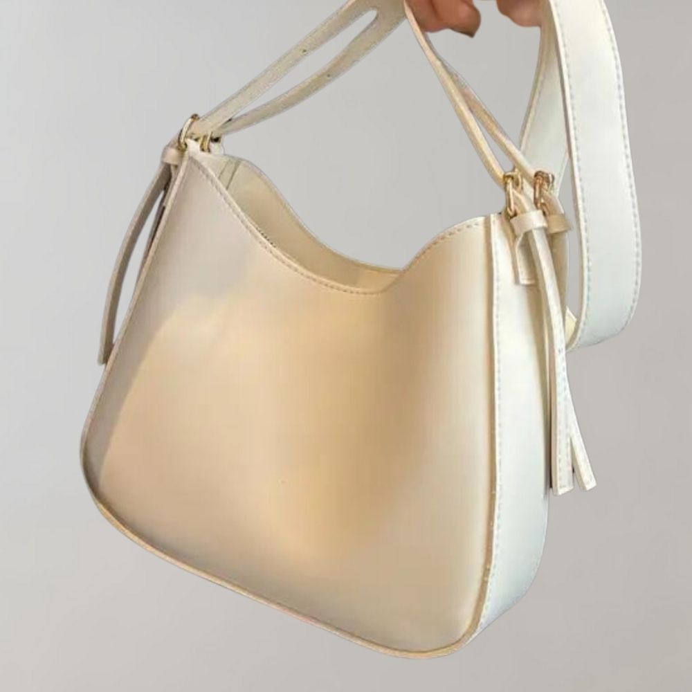 Minimalistisk crossbody handväska för kvinnor, elegant design, ergonomisk, flera färger, perfekt för alla tillfällen.