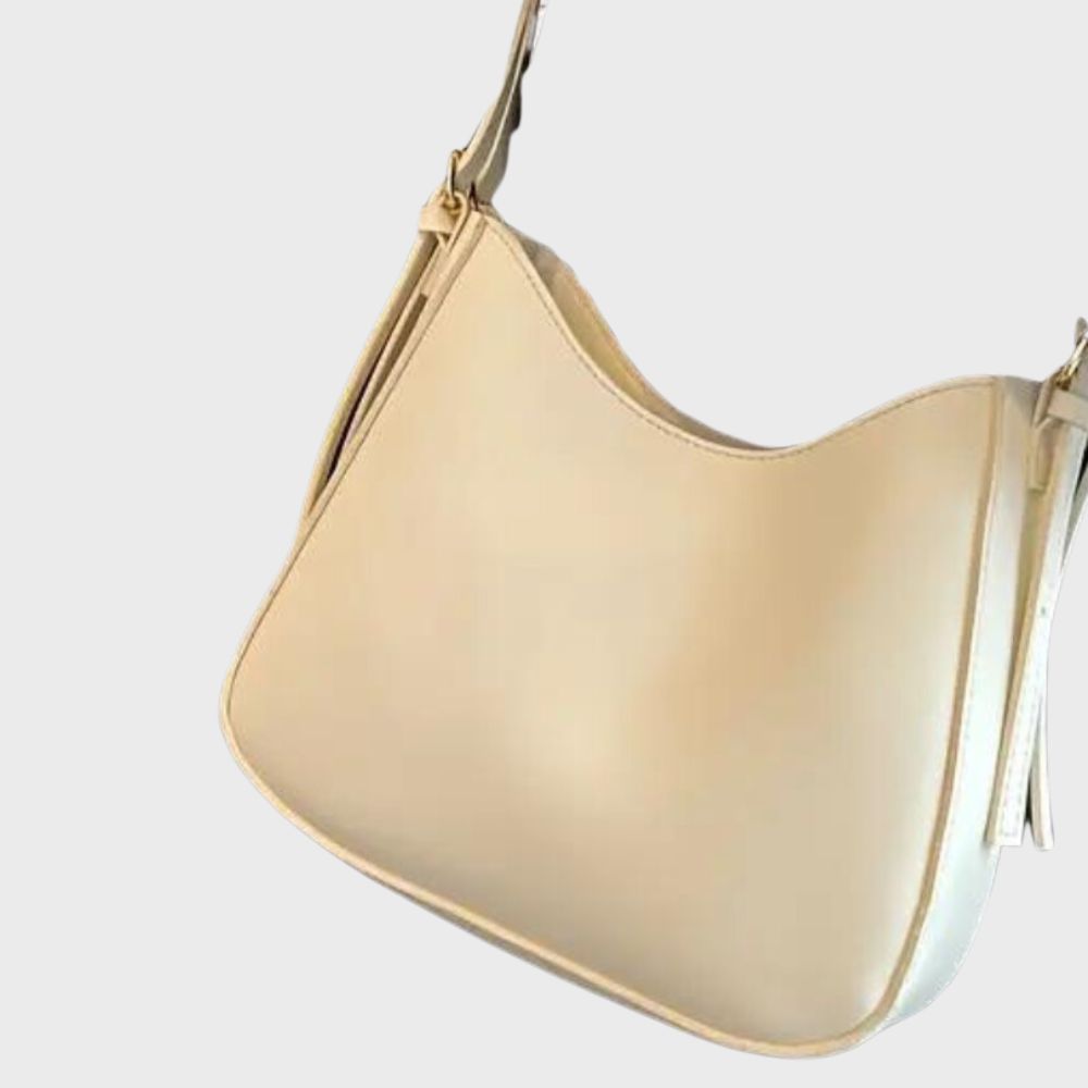 Minimalistisk crossbody handväska för kvinnor, elegant design, ergonomisk, flera färger, perfekt för alla tillfällen.