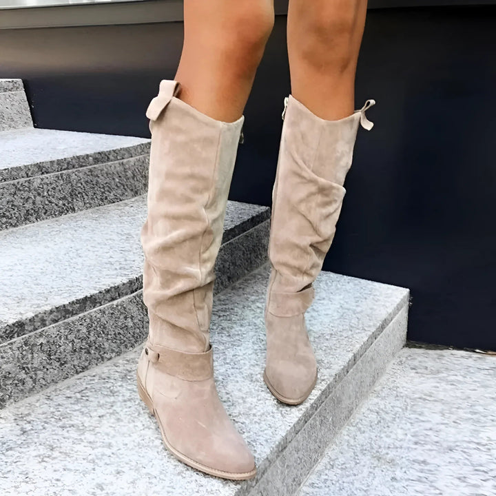 Mångsidiga damstövlar för höst och vinter, robust konstruktion, klassiskt utseende, svart, beige, brun och mörkgrön.