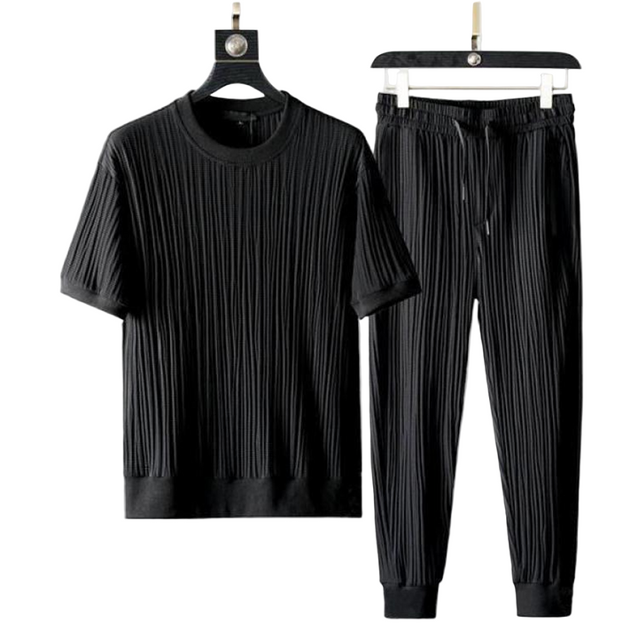 Mäns casual set för höst med O-hals tröja och avslappnade byxor i blå, svart, grå och vit för stil och komfort.
