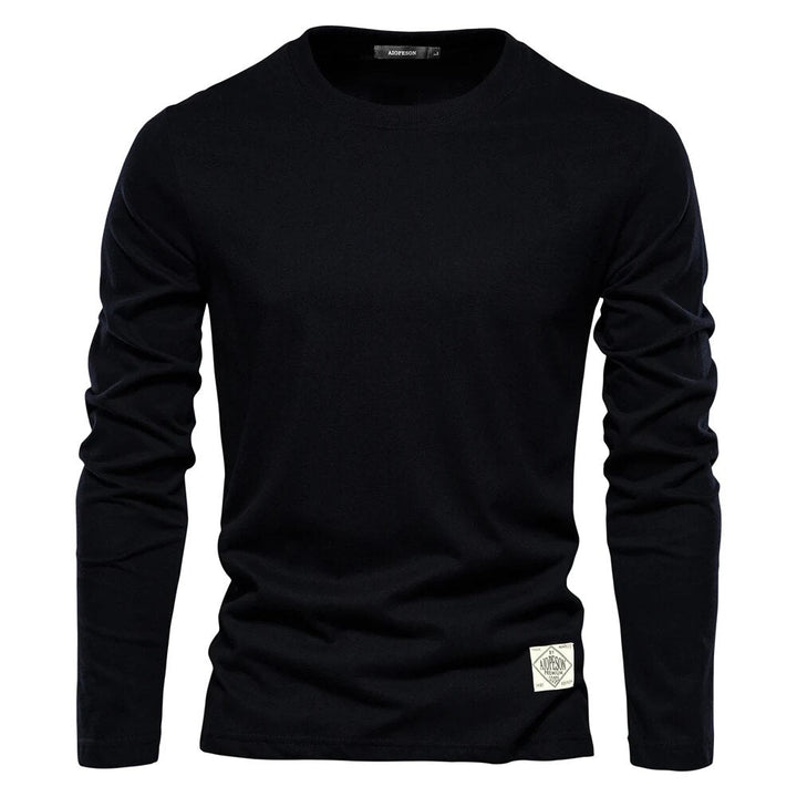 "Mäns klassisk O-ringad långärmad T-shirt, bekväm och stilren i mjukt tyg, framifrån med neutral färg."