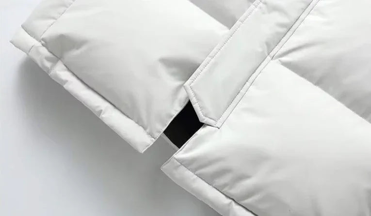 "Mäns lång puffer parka vinterjacka i svart, stilren och varm design, perfekt för kalla dagar och modern stil."