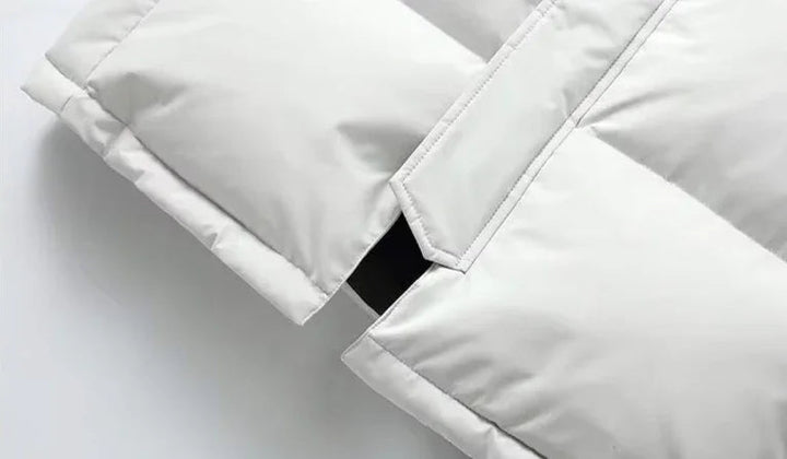 "Mäns lång puffer parka vinterjacka i svart, stilren och varm design, perfekt för kalla dagar och modern stil."