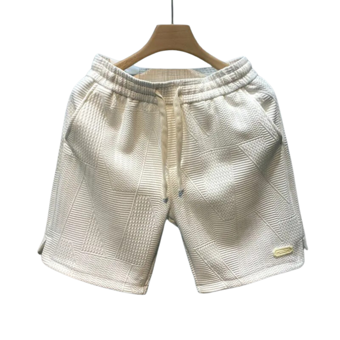 "Mäns sportshorts med vågmönster, justerbar midja och bekväm passform, perfekt för träning och fritid."