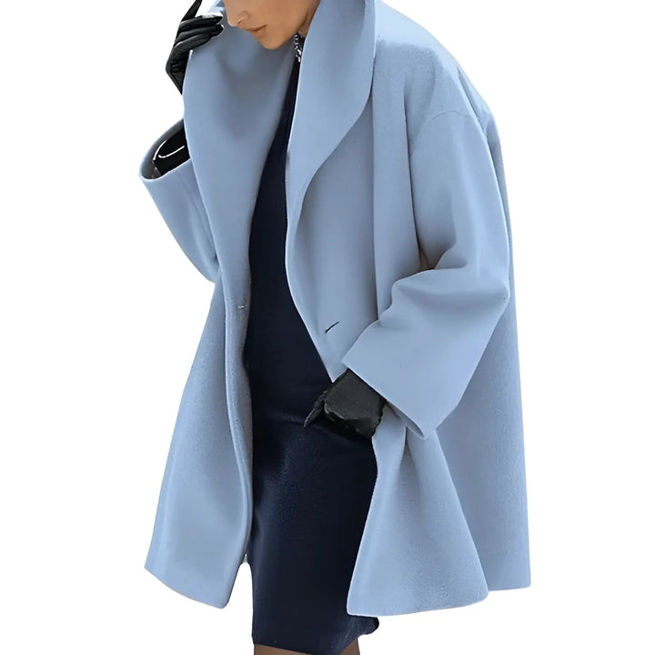 Modern damtrenchcoat med elegant design, värmande material. Perfekt för stil och skydd, passar alla tillfällen.