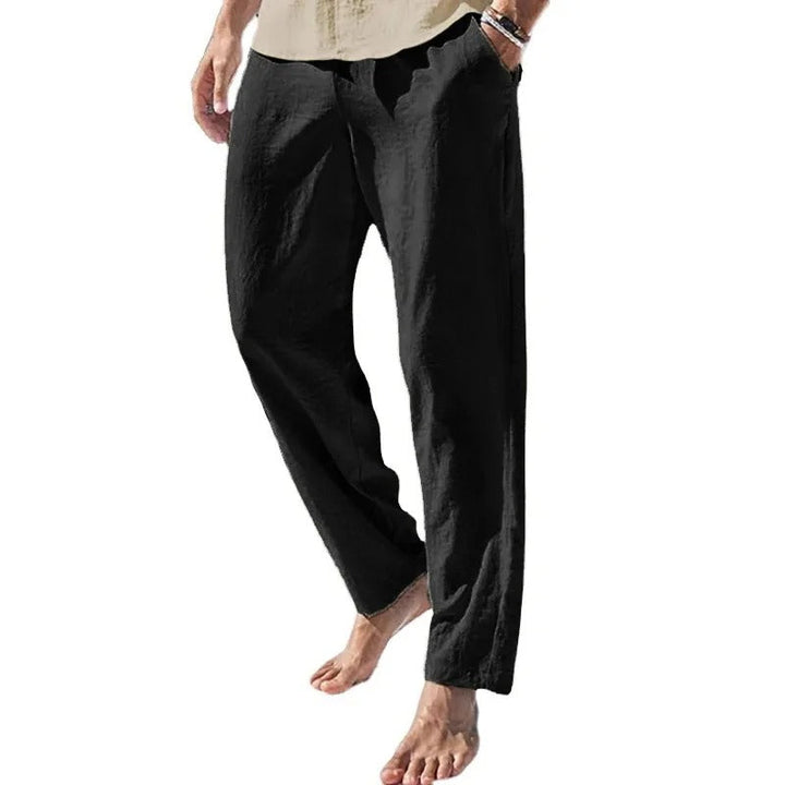 "Modernt linne-stil herrbyxor, raka med elastisk midja, i enfärgad streetwear design, perfekt för alla tillfällen."