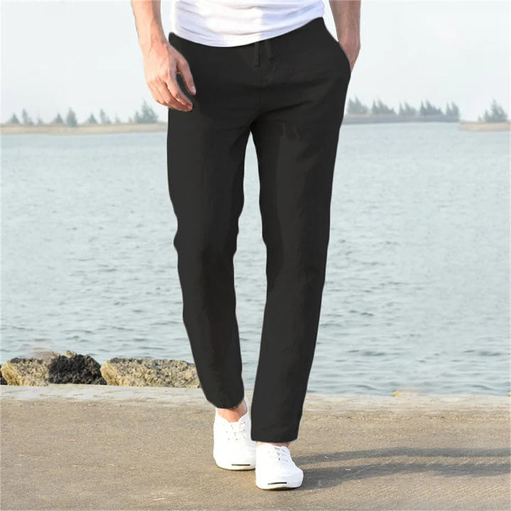 "Modernt linne-stil herrbyxor, raka med elastisk midja, i enfärgad streetwear design, perfekt för alla tillfällen."