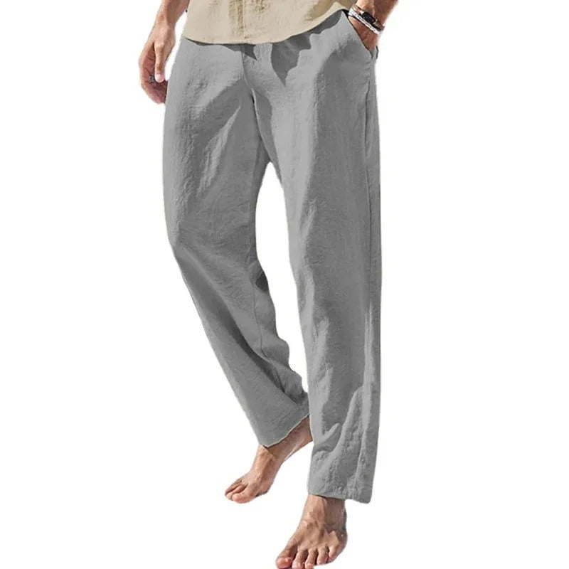 "Modernt linne-stil herrbyxor, raka med elastisk midja, i enfärgad streetwear design, perfekt för alla tillfällen."