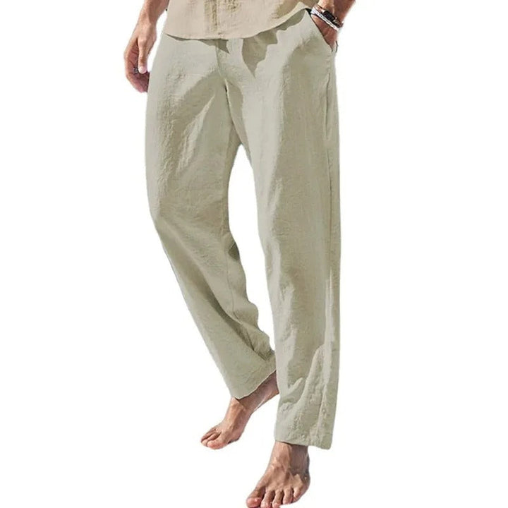 "Modernt linne-stil herrbyxor, raka med elastisk midja, i enfärgad streetwear design, perfekt för alla tillfällen."