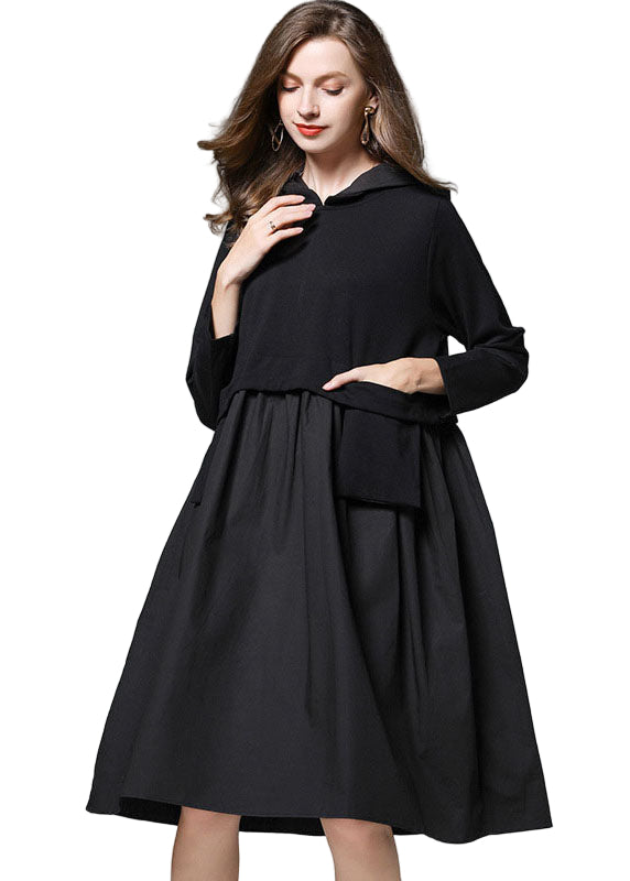 Mörkgrön långärmad höstklänning med svarta fickor, avslappnad passform, idealisk för kvinnor i svalare väder.