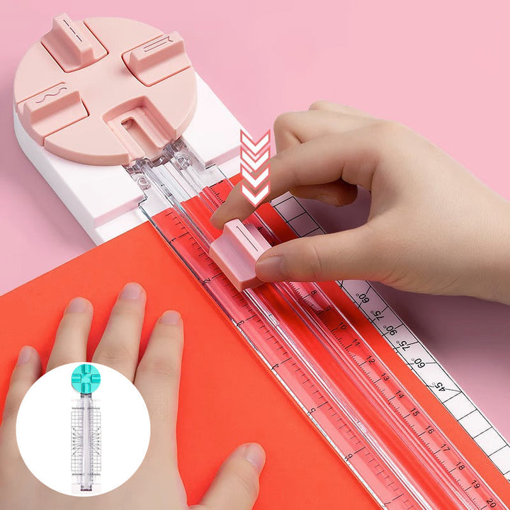 "Multifunktionell 4-i-1 pappersskärare i rosa och blå plast, perfekt för hantverk som scrapbooking med precisionsskärning."