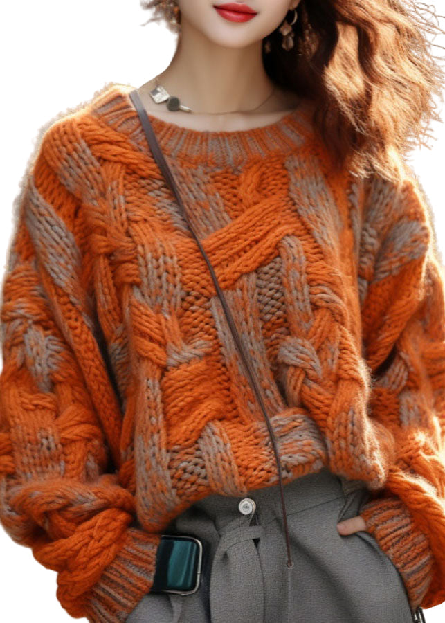 Orange plus size kabelstickad tröja för damer, mjukt material och loose fit, perfekt för kyliga vinterdagar.