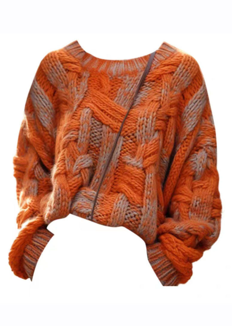 Orange plus size kabelstickad tröja för damer, mjukt material och loose fit, perfekt för kyliga vinterdagar.