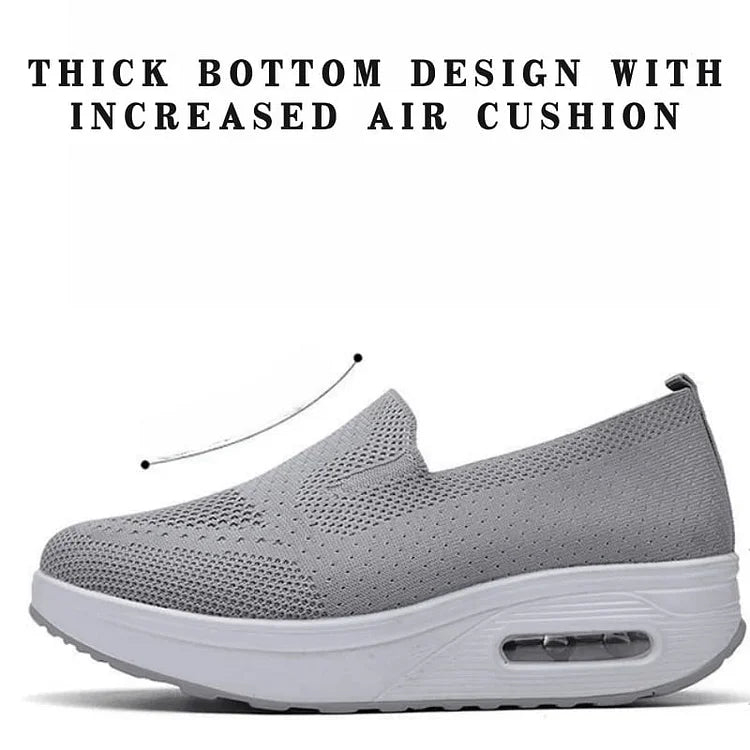 Ortopediska sneakers för kvinnor i grått, andningsbart syntetmaterial, ortopediskt stöd och enkel snörning.