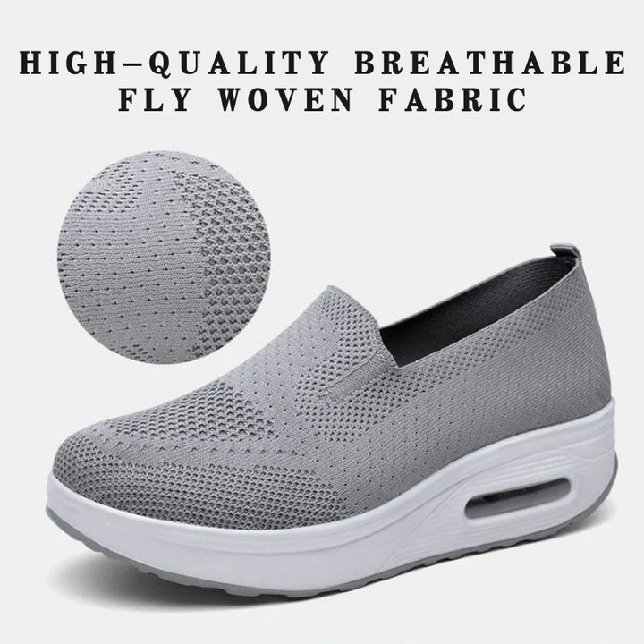 Ortopediska sneakers för kvinnor i grått, andningsbart syntetmaterial, ortopediskt stöd och enkel snörning.