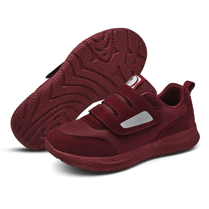 Ortopediska unisex slip-on sneakers för diabetiker med justerbar rem, anti-slip sula, rymlig passform och sportig design.