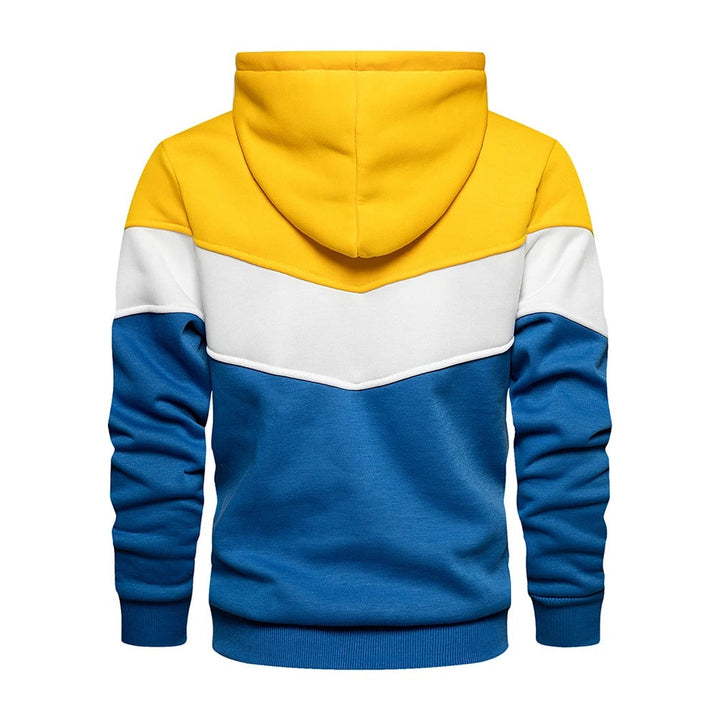 "Patchwork Fleece Hoodie för män i mjuk fleece med unik lapptäcksdesign, perfekt för avslappnad stil och komfort."