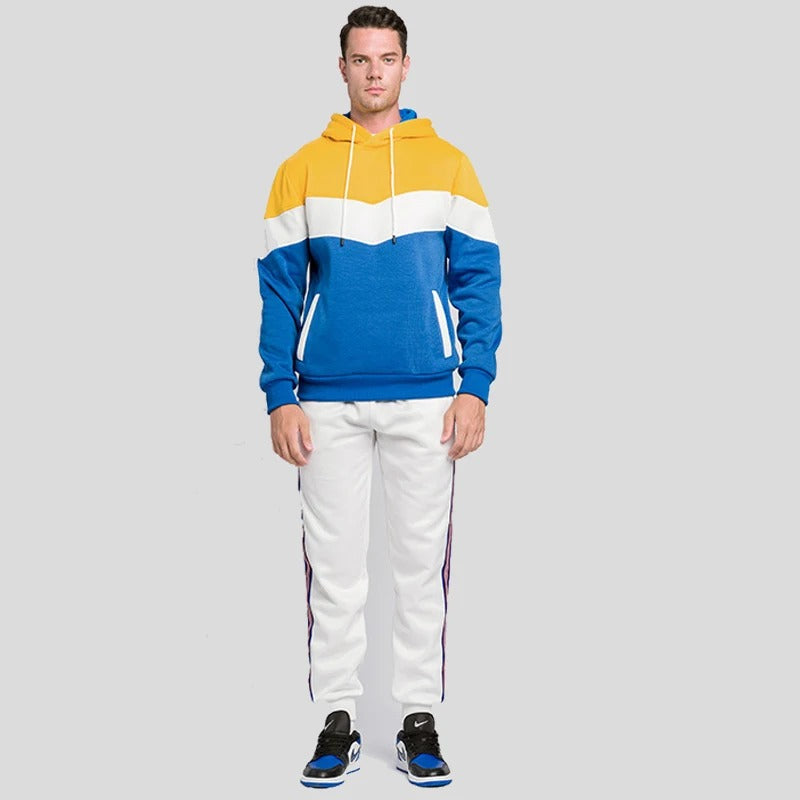 "Patchwork Fleece Hoodie för män i mjuk fleece med unik lapptäcksdesign, perfekt för avslappnad stil och komfort."