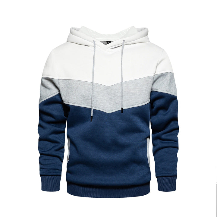 "Patchwork Fleece Hoodie för män i mjuk fleece med unik lapptäcksdesign, perfekt för avslappnad stil och komfort."