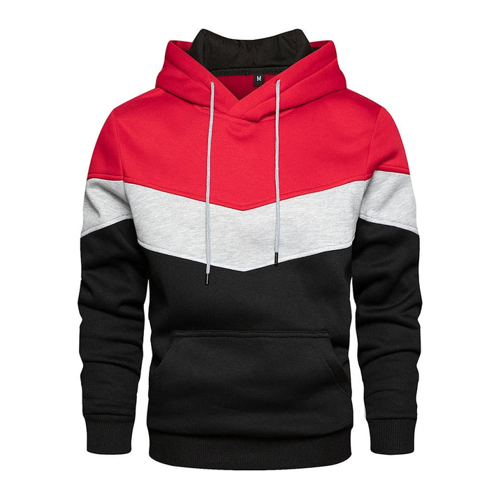 "Patchwork Fleece Hoodie för män i mjuk fleece med unik lapptäcksdesign, perfekt för avslappnad stil och komfort."