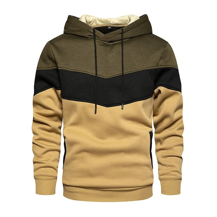 "Patchwork Fleece Hoodie för män i mjuk fleece med unik lapptäcksdesign, perfekt för avslappnad stil och komfort."