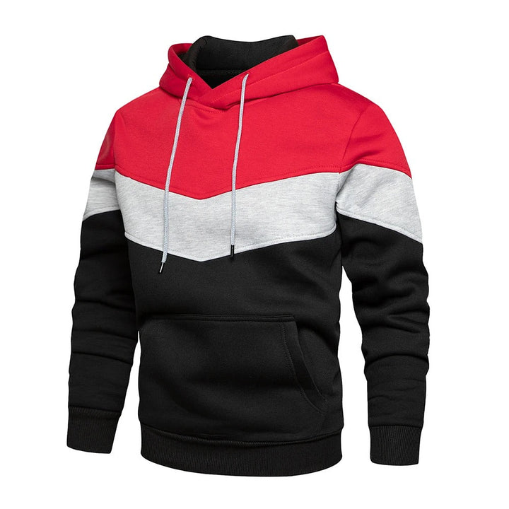 "Patchwork Fleece Hoodie för män i mjuk fleece med unik lapptäcksdesign, perfekt för avslappnad stil och komfort."