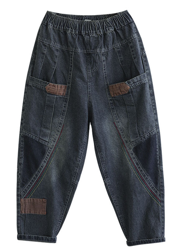 "Patchwork denimbyxor med praktiska fickor, hög midja och lös passform, idealiska för damernas höstmode."