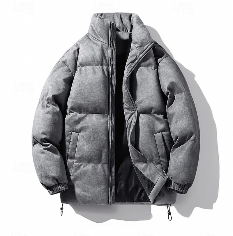 "Quiltad herr vinterjacka i modern stil, elegant design, svart färg, värmande och bekväm för kalla dagar, lätt att styla."