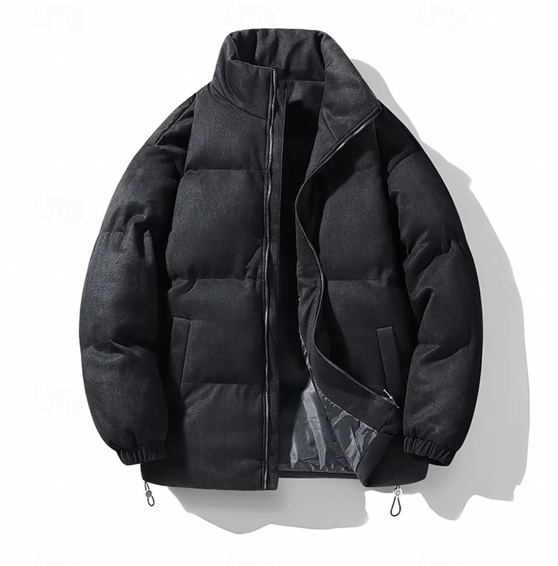 "Quiltad herr vinterjacka i modern stil, elegant design, svart färg, värmande och bekväm för kalla dagar, lätt att styla."