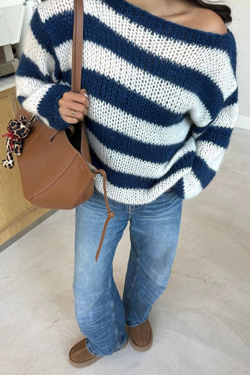 Randig pullover tröja med avslappnad passform och drop shoulder-design för kvinnor. Perfekt för vår- och höstgarderoben.