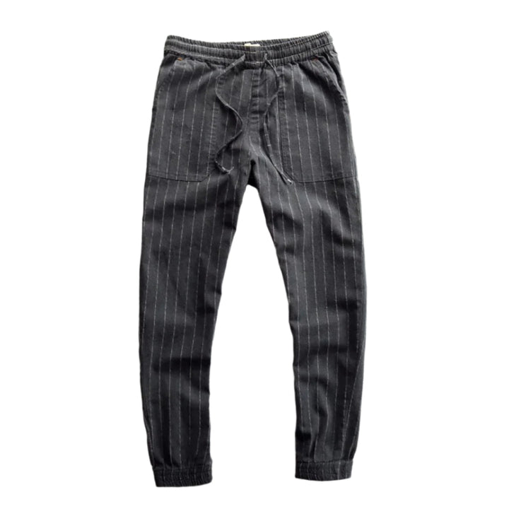 Randiga dambyxor med elastisk midja, bekväma och eleganta, perfekt för vardagens alla tillfällen.