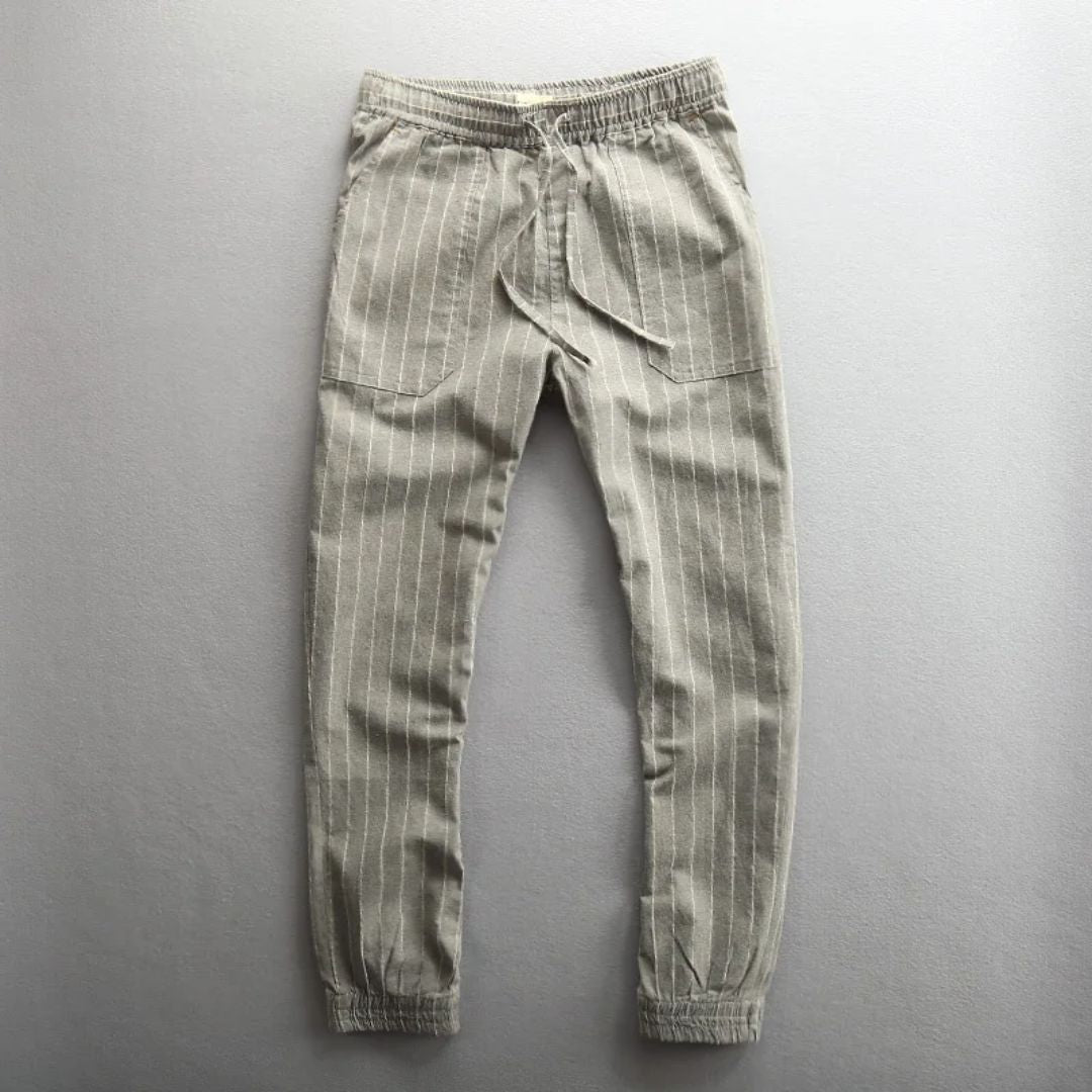 Randiga dambyxor med elastisk midja, bekväma och eleganta, perfekt för vardagens alla tillfällen.