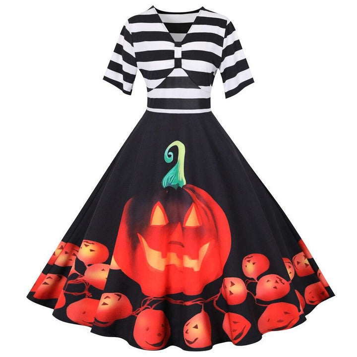 "Retro damklänning med pumpamotiv i mjukt tyg, midi-längd, perfekt för Halloween-fester och höstfiranden."